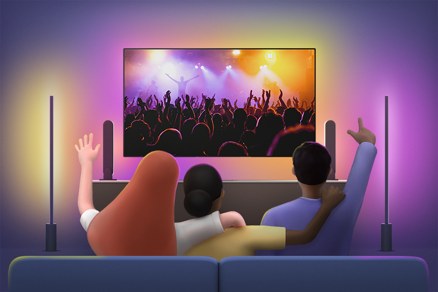 TV로 콘서트 영상을 보고 있는 가족의 모습