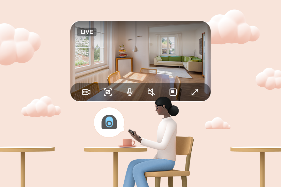 카페에 앉아 집 안에 설치된 홈 카메라를 확인하는 여자